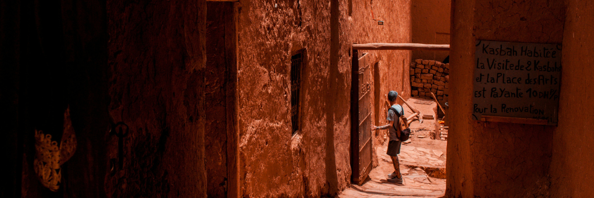 men in alley of ait benhaddou